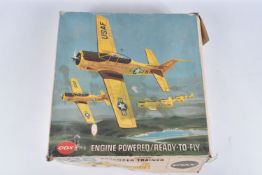 A BOXED COX NORTH AMERICAN AVIATION T-28 ADVANCE TRAINER 049 ENGINE POWERED READY TO FLY AIRCRAFT