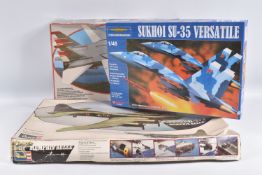 THREE BOXED MODEL MILITARY AIRPLANE KITS, to include a Revell 1:32 scale F=14A Tomcat kit no. H-
