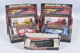 THREE BOXED SCALEXTRIC FORMULA 1 RACING CARS, Wolf WR5, No.C133, Ely Tyrrell 008, No.C135 and