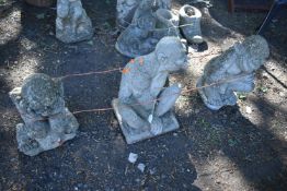 THREE WEATHERED COMPOSITE GROTESQUES, in various positions, condition report, no visible faults (3)