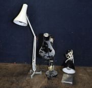 THREE ARTICULATED TABLE LAMPS, including two Anglepoise ltd lamps, one black and one white on a test