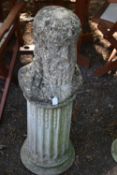A WEATHERED COMPOSITE GARDEN BUST OF CLASSICAL ROMAN MALE, on a matched reeded pillar, height 92cm x