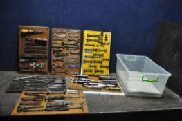 A BOX CONTAINING CARDED DISPLAYS OF VINTAGE SPANNERS, GREASE GUNS, GRIPS makers include Triumph,