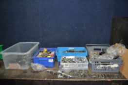 FIVE TRAYS CONTAINING VINTAGE CAR PARTS including an Austin bonnet end with emblem, number plate