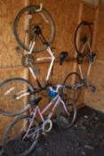 THREE VARIOUS BIKES, to include a Peugeot Etoile road bike, with a 24 '' frame, a Raleigh boys bike,