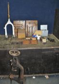 A COLLECTION OF AUTOMOTIVE TOOLS AND PARTS including a Lambretta front fork set, a vintage manual