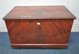 A 20TH CENTURY STAINED PINE BLANKET CHEST, with twin metal handles, the lid enclosing a candle