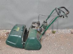 AN ATCO BALMORAL 20s PETROL CYLINDER MOWER, with grass box (engine pulls freely but hasn't started)