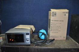 A COLLECTION OF HOUSEHOLD ITEMS, including a boxed LPG heater, a Russell Hobbs microwave and a Steam