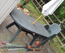 A GREEN PLASTIC GARDEN TABLE AND SEVEN MATCHING CHAIRS, along with Gardena and Fiskars pruning tools