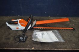 A STIHL HSA 45 CORDLESS HEDGE TRIMMER, with manual and power supply (PAT pass and working)