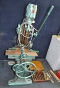 A GEORGE HATCH OF LONDON VINTAGE MORTICING MACHINE, with a cast iron frame (very HEAVY) and twelve