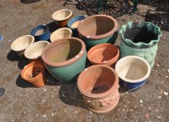 A SELECTION OF GARDEN POTS, including nine glazed, three terracotta and a verd de Gris painted