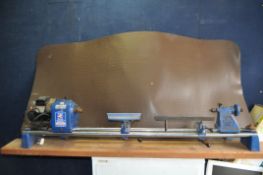 A RECORD No.2 WOODWORKING LATHE, with 177cm base bars, a Record power Chuck, and a set of Record