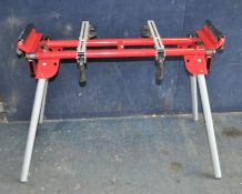 A WORKZONE TITANIUM + COMPOUND MITRE SAW FOLDING STAND, with roller extensions