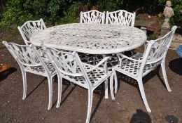 A CAST ALUMINIUM GARDEN TABLE AND SIX MATCHING CARVER CHAIRS, with tulip detailing to all, table