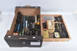 A OO GAUGE LOCOMOTIVE SCRAP YARD, assorted damaged and incomplete locomotives, bodyshells,