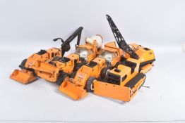 SEVEN ITEMS OF TONKA TOYS CONSTRUCTION EQUIPMENT, all in dark yellow/orange livery, three
