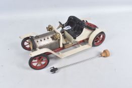 AN UNBOXED MAMOD ROADSTER SA1 LIVE STEAM VEHICLE, cream body with black and red detail, some rusting