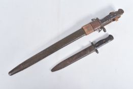 A 1907 PATTERN REMINGTON BAYONET AND A BRITISH JUNGLE CARBINE BAYONET, the Remington Bayonet has the