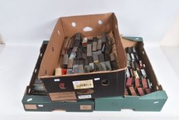 A QUANTITY OF UNBOXED AND ASSORTED OO GAUGE FREIGHT ROLLING STOCK, all in playworn condition,