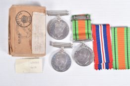 A BOXED PAIR OF ROYAL AIRFORCE WWII MEDALS AND SEPERATE DEFENCE MEDAL, the boxed pair was awarded to