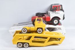 TWO MIGHTY TONKA TOYS ARTICULATED CAR CARRIERS/TRANSPORTERS, one in black livery, the other with