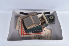 A BOX OF MIXED MILITARIA TO INCLUDE GAS MASK, LUITANIA MEDAL, BLACKOUT LAMP, ID CARDS, ration book