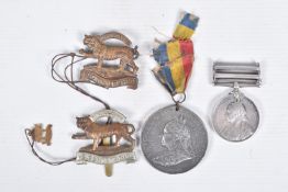 A VICTORIAN QUEENS SOUTH ARFICA MEDAL VICTORIAN MEDALLION AND TWO CAP BADGES, the medal comes with