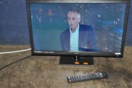 A TECHNIKA 24in TV with remote (PAT pass and working)
