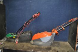 A FLYMO EASI GLIDE 300 ELECTRIC LAWN MOWER (PAT pass and working) and a Qualcast electric lawn mower