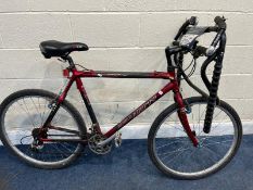 AN AL CARTER CARBON COUNTY GENTS MOUNTAIN BIKE with 21 speed Shimano gears, 21in frame and a HB