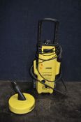 A KARCHER K2.56 PRESSURE WASHER with lance, two nozzles and a patio head with extension (PAT pass