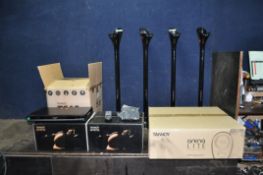 A TANNOY ARENA HOME CINEMA SPEAKER SYSTEM, that appear to be brand new and sealed in boxes, to