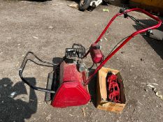 A QUALCAST SPP 17s PETROL CYLINDER MOWER fitted with a scarifier attachment along with a cylinder