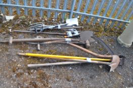 A SELECTION OF GARDEN TOOLS including vintage oast shovel, scythe, post shovels and modern spades,