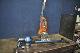 A VAX POWER MAX CARPET WASHER (handle repaired with tape) and a Hoover 22v cordless vacuum cleaner