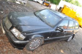 A 1998 MERCEDES C240 ESPRIT FIVE DOOR ESTATE CAR FOR SPARES OR REPAIRS in black with a 2398cc petrol