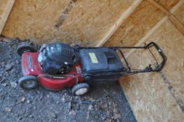 A MOUNTFIELD SELF PROPELLED PETROL LAWN MOWER with grass box and a Honda GCV135 engine fitted (