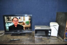A SONY KDL-32V5500 32in TV with remote, a Panasonic bread maker and a Morphy Richards microwave (all