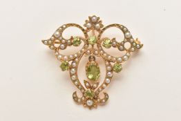 A 9CT GOLD PERIDOT AND SPLIT PEARL SET LAVALIER PENDANT/BROOCH, open work design set with six
