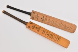 TWO SMALL COMMEMORATIVE CRICKET BATS, printed with signatures, comprising a Gunn & Moore bat printed