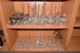 A COLLECTION OF GLASS CHEMISTRY BOTTLES AND FLASKS, ETC, to include approximately twenty flasks of