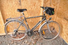 A MBK SAINT GERMAIN GENTS MOUNTAIN BIKE, with 18 speed Shimano twist grip gears, 21 in frame,