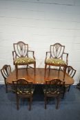 AN EARLY 20TH CENTURY MAHOGANY TRIPLE PEDESTAL DINING TABLE, the two end pedestals with three