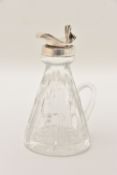 A CRYSTAL CUT GLASS AND SILVER CAPPED WHISKY NOGGIN hallmarked 'J.B Chatterley & Sons Ltd Birmingham
