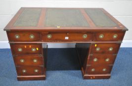 A 20TH CENTURY YEW WOOD TWIN PEDESTAL DESK, with a three green leather writing surfaces, with