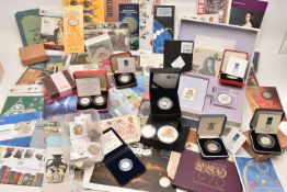 A CARDBOARD BOX CONTAINING ROYAL MINT COIN PACK AND CASED COINS, to include 2002 Manchester