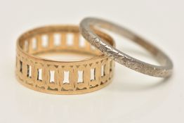 TWO RINGS, the first an 18ct gold open work wide band, approximate band width 7.4mm, hallmarked 18ct
