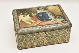 A LOCKABLE BISCUIT TIN WITH A CAT SCENE and foliate pattern to the border and the lower part of
